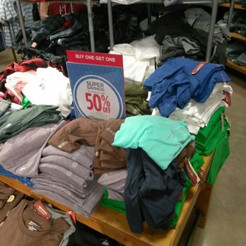 JCPenney - More clothes wadded up on top of the display. - Department Stores Near Me - Escondido, California
