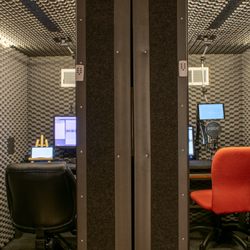 Post Hypnotic Press - We use these 2 booth together - the engineer/director on the left and the narrator is on the right. We can record 2 actors, too.