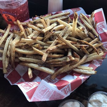 Lil Woody's - Basket of fries is definitely shareable - Burgers Near Me - Seattle, Washington Lil Woody's - Basket of fries is definitely shareable - Burgers Near Me - Seattle, Washington