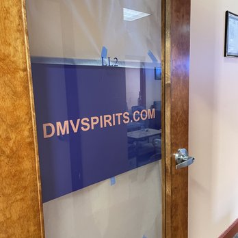 DMV Spirits - a glass door with the dmv spirits logo on it - Beer, Wine & Spirits Near Me - Washington, DC, District of Columbia