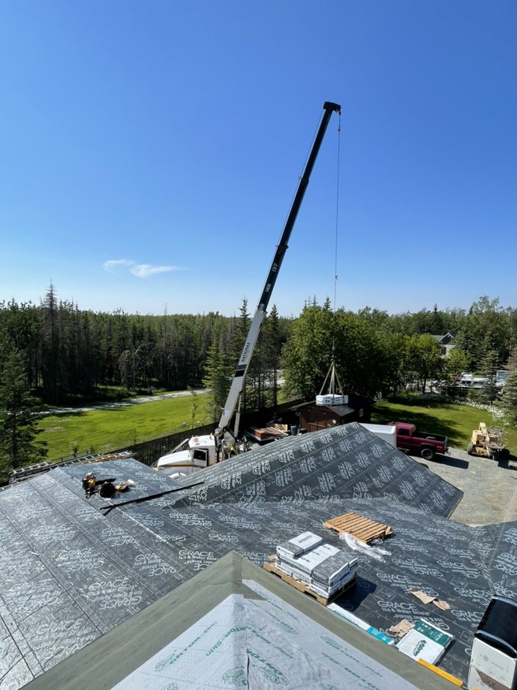 Slide of K-Bay Roofing