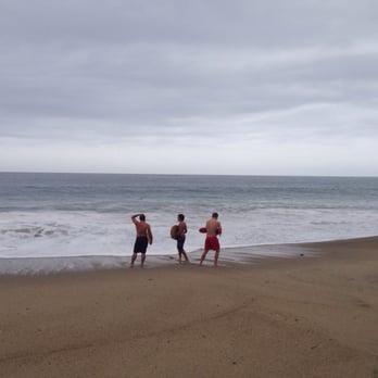 Mugu Beach - Lifeguard telling the boys to not go too far in - Beaches Near Me - Malibu, California