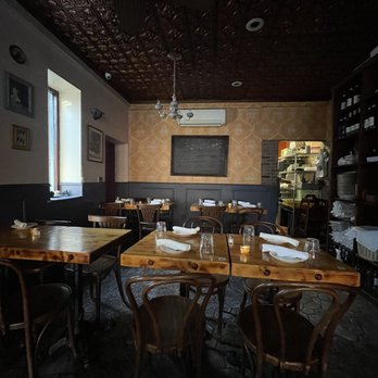 Piccoli Trattoria - tables and chairs in a restaurant - Italian Near Me - Brooklyn, New York Piccoli Trattoria - tables and chairs in a restaurant - Italian Near Me - Brooklyn, New York