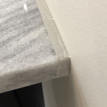 Marble Builder Direct - Counters cut short and tried to fill with epoxy to cover the difference - Countertop Installation Near Me - Cleveland, Ohio