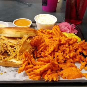 The Deck - Smoked pulled chicken sandwich with sweet potato fries - American Near Me - Muskegon, Michigan The Deck - Smoked pulled chicken sandwich with sweet potato fries - American Near Me - Muskegon, Michigan