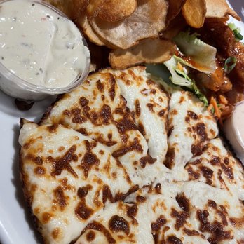 Boston Pizza - a plate of pizza and chips - Pizza Near Me - Niagara Falls, Ontario