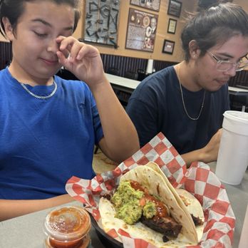 Smolik's Smokehouse - Brisket tacos loaded with guacamole. OMG mouth watering. My son devoured them. - Barbeque Near Me - Mathis, Texas