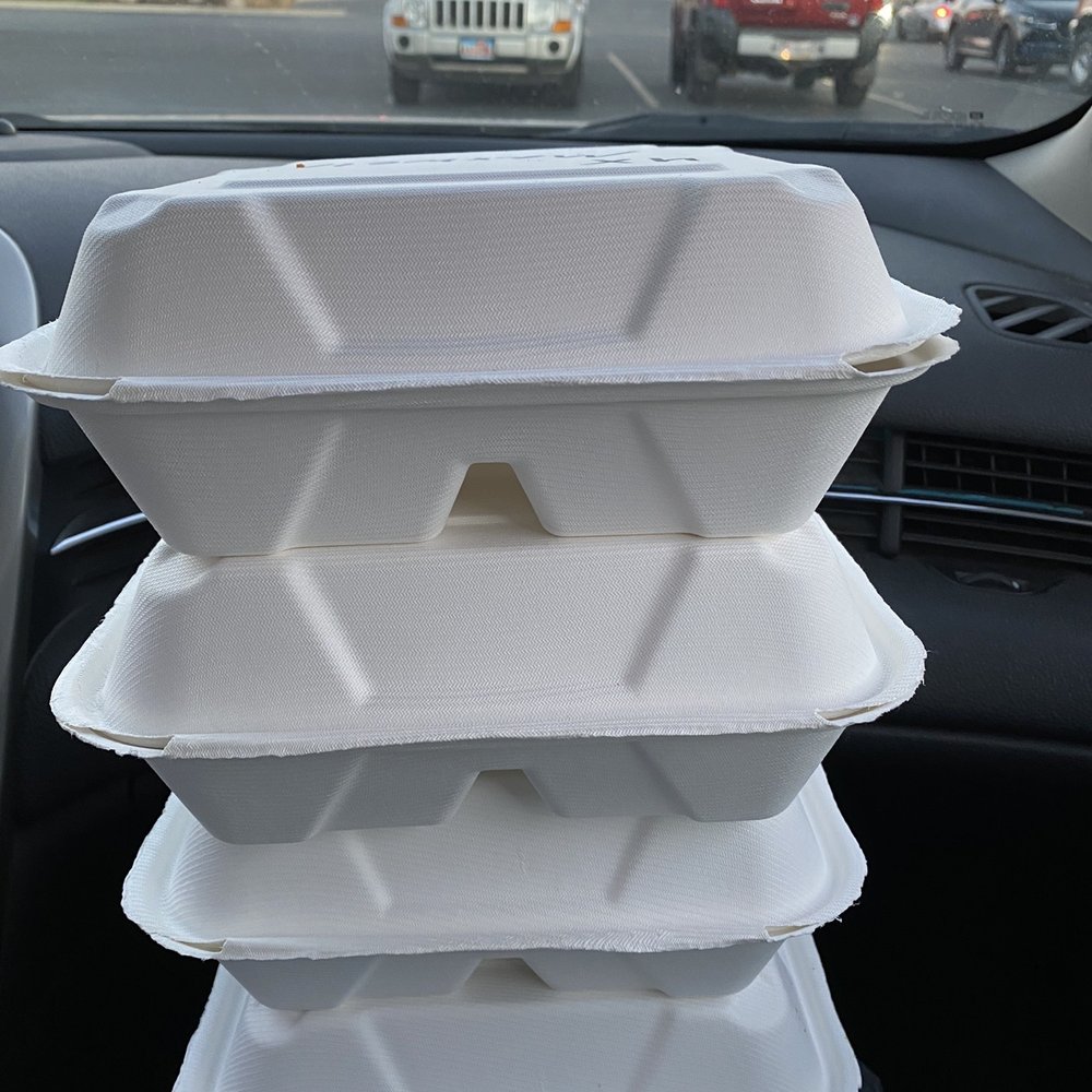 On the Hook - a stack of trays - Food Trucks Near Me On the Hook - a stack of trays - Food Trucks Near Me