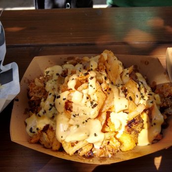 Lucy's on Lighthouse - The Shove It tots - the fried onions, cheese sauce and pulled pork were great - Hot Dogs Near Me - Pacific Grove, California Lucy's on Lighthouse - The Shove It tots - the fried onions, cheese sauce and pulled pork were great - Hot Dogs Near Me - Pacific Grove, California