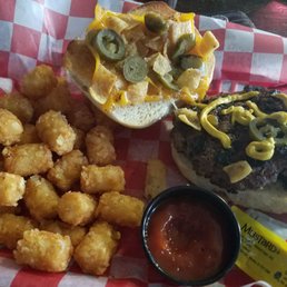 Frito Bandito Burger Fresh bread, black beans, jalapenos, and cheddar cheese and some tater tots. Frito Bandito Burger Fresh bread, black beans, jalapenos, and cheddar cheese and some tater tots.