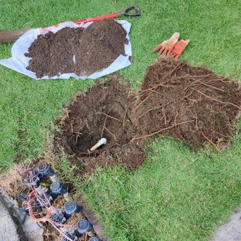 CJ Landscape and Yard Maintenance - a pile of dirt, a shovel, and a pair of gardening gloves - Landscaping Near Me - Honolulu, Hawaii