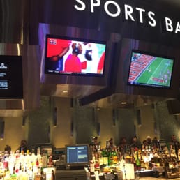 the bar and televisions in the background the bar and televisions in the background