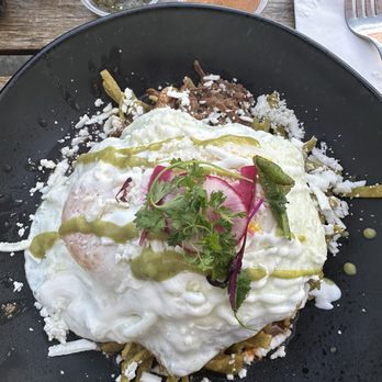 Lola Cafe - Chilaquiles with Barbacoa and Verdes sauce... - Breakfast & Brunch Near Me - Los Angeles, California Lola Cafe - Chilaquiles with Barbacoa and Verdes sauce... - Breakfast & Brunch Near Me - Los Angeles, California