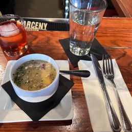 A bowl of potato bacon soup with a Negroni cocktail delicious! A bowl of potato bacon soup with a Negroni cocktail delicious!