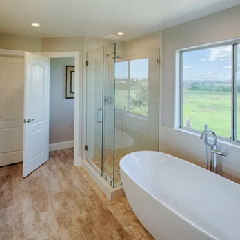 Left Coast Construction - a large bathroom with a large tub - General Contractors Near Me Left Coast Construction - a large bathroom with a large tub - General Contractors Near Me