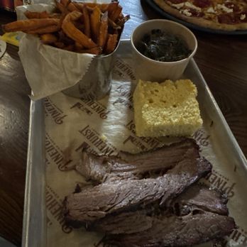 Pinehurst Brewing Company - Beef brisket, corn bread, collards, and sweet potato fries. - Brewpubs Near Me - Pinehurst, North Carolina Pinehurst Brewing Company - Beef brisket, corn bread, collards, and sweet potato fries. - Brewpubs Near Me - Pinehurst, North Carolina