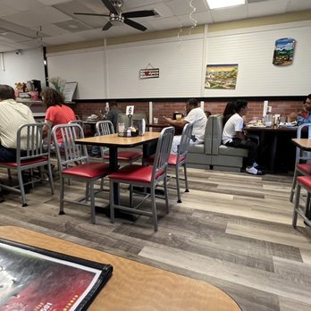 Cafeteria Tia Roseta - people sitting at tables in a restaurant - Mexican Near Me - Roswell, Georgia
