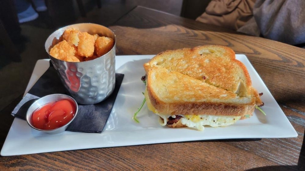 Spicy Egg Sandwich with Tater Tots Yelp