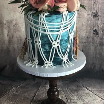 Handcrafted Cakes and Sweets - Callebaut chocolate cake filled with chocolate cream cheese icing. French macarons filled with caramel. - Custom Cakes Near Me Handcrafted Cakes and Sweets - Callebaut chocolate cake filled with chocolate cream cheese icing. French macarons filled with caramel. - Custom Cakes Near Me