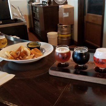 Eli Fish Brewing Company - A couple beer flights with the Tavern Chips appetizer. The appetizer was excellent, I'd order that next time I come for beer tasting! - Breweries Near Me - Batavia, New York Eli Fish Brewing Company - A couple beer flights with the Tavern Chips appetizer. The appetizer was excellent, I'd order that next time I come for beer tasting! - Breweries Near Me - Batavia, New York