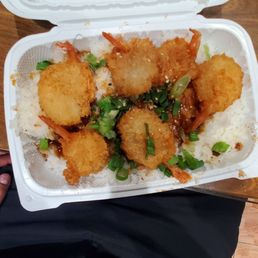 5 piece shrimp on cold rice. 5 piece shrimp on cold rice.
