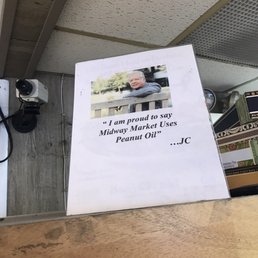 a picture of a man sitting on a bench