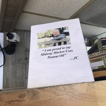 Midway Market - a picture of a man sitting on a bench - Grocery Near Me - New Milford, Connecticut