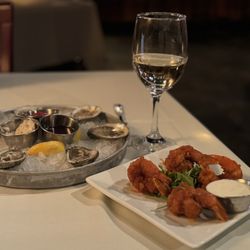 Norfolk Seafood Company & Oyster Bar - Happy hour raw oysters and buffalo shrimp