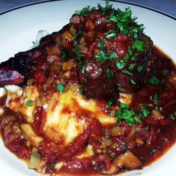 Cafe Santorini - Lamb shank braised with sun-dried tomatoes, $24. - Italian Near Me - Pasadena, California Cafe Santorini - Lamb shank braised with sun-dried tomatoes, $24. - Italian Near Me - Pasadena, California