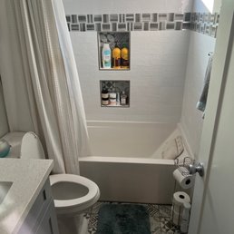 Remodeled restroom after rodent infestation below tub. Remodeled restroom after rodent infestation below tub.