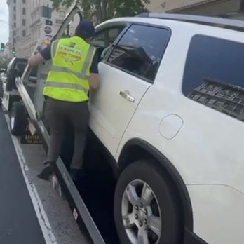 DMV Magic Towing - Tow driver loading car - Towing Near Me - Vienna, Virginia