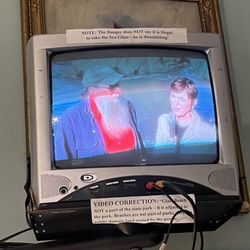 Glass Beach Jewelry and Museum - One of the 4 tiny TVs playing all at once. No description