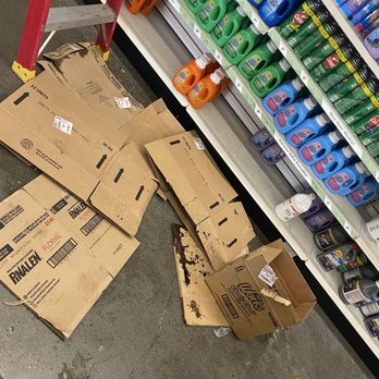 Dollar Tree - Spilled product with cardboard boxes thrown on top blocking walkway - Discount Store Near Me - Portland, Oregon