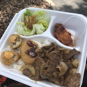 Korean BBQ Taco Box - a plate of food - Street Vendors Near Me Korean BBQ Taco Box - a plate of food - Street Vendors Near Me