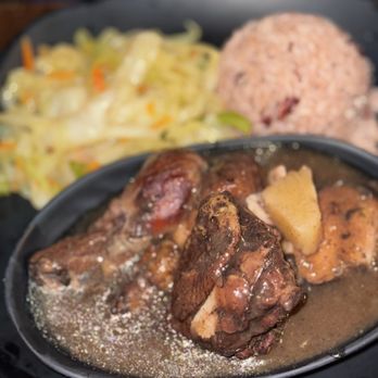 The Island Spot - Brown Stew Chicken (B), rice and peas - Caribbean Near Me - Carrollton, Texas The Island Spot - Brown Stew Chicken (B), rice and peas - Caribbean Near Me - Carrollton, Texas