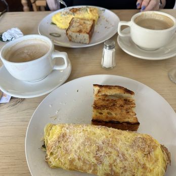 The Pacific Way - Garlic and spring onion omelet on top and root vegetable omelet on bottom with mochas. - New American Near Me - Gearhart, Oregon The Pacific Way - Garlic and spring onion omelet on top and root vegetable omelet on bottom with mochas. - New American Near Me - Gearhart, Oregon