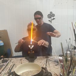 Tsunami's Glass Shop - Ben helping make a glass rose!