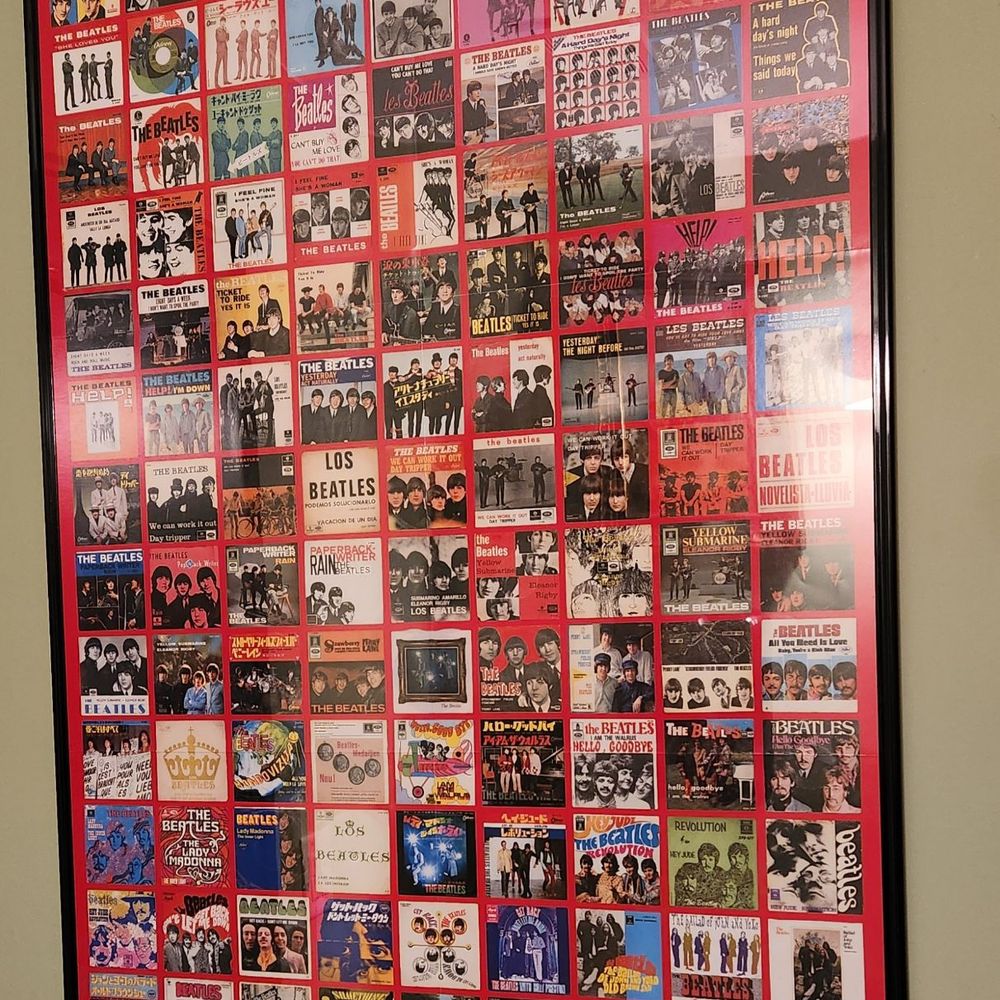 Audacity British Style Pub - Huge Beatles album cover poster in the M/F restroom - Pubs Near Me - Manchester, Connecticut