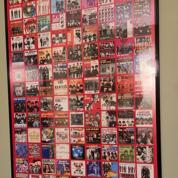 Audacity British Style Pub - Huge Beatles album cover poster in the M/F restroom - Pubs Near Me - Manchester, Connecticut