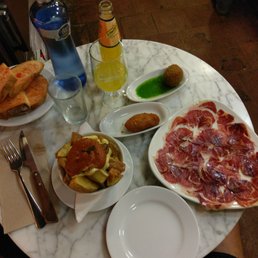 Croquettes...ham and squid, thinly sliced ham, toasted buttered bread,  and potatoes braves.