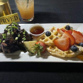 SAGE Kitchen & Cocktails - Jerk chicken and waffles - Caribbean Near Me - Charlotte, North Carolina SAGE Kitchen & Cocktails - Jerk chicken and waffles - Caribbean Near Me - Charlotte, North Carolina