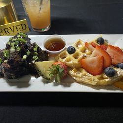 SAGE Kitchen & Cocktails - Jerk chicken and waffles