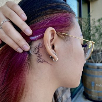 MODO Ink Tattoo - orchid fine line behind ear (fresh with second skin) - Tattoo Near Me - Orange, California MODO Ink Tattoo - orchid fine line behind ear (fresh with second skin) - Tattoo Near Me - Orange, California