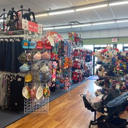 Once Upon A Child - Fourth of July/seasonal rack is right to the right of the entry door