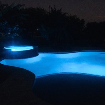 South Texas Pools - Poolside at night - General Contractors Near Me - La Feria, Texas South Texas Pools - Poolside at night - General Contractors Near Me - La Feria, Texas