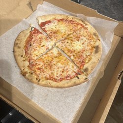 Ted's Most Best - Thin, only cheese with barely any sauce and extremely cold.