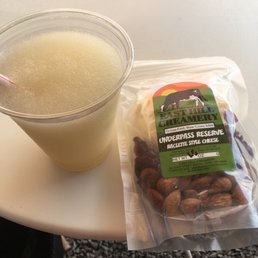 a drink and a snack on a table a drink and a snack on a table