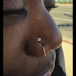 Barbella Studios - Nostril Piercings with a Celestial end from Buddha Jewelry