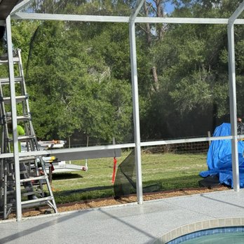Replace my Cage - The old screen cage that had seen better days and still had some damage from Hurricane Ian. - Patio Coverings Near Me - Sarasota, Florida Replace my Cage - The old screen cage that had seen better days and still had some damage from Hurricane Ian. - Patio Coverings Near Me - Sarasota, Florida