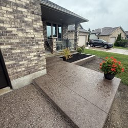 GEM Concrete Construction - Exposed aggregate entrance with planter box